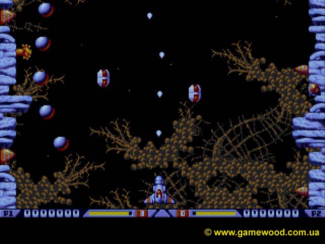 Скриншот игры Xenon 2: Megablast | Sega Mega Drive 2 (Genesis) | Вертикальный скролл-шутер